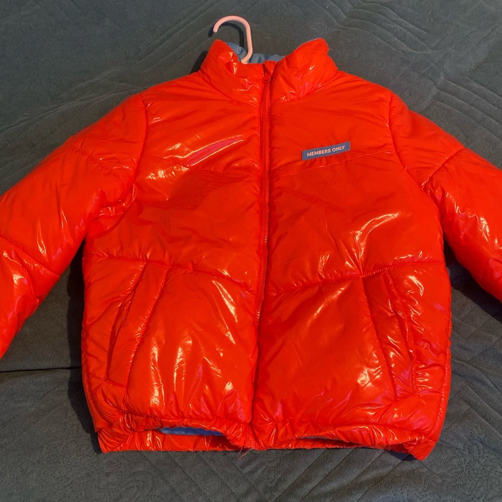 orange members only jacket, bought it 2 years ago. i can no longer fit, size s .